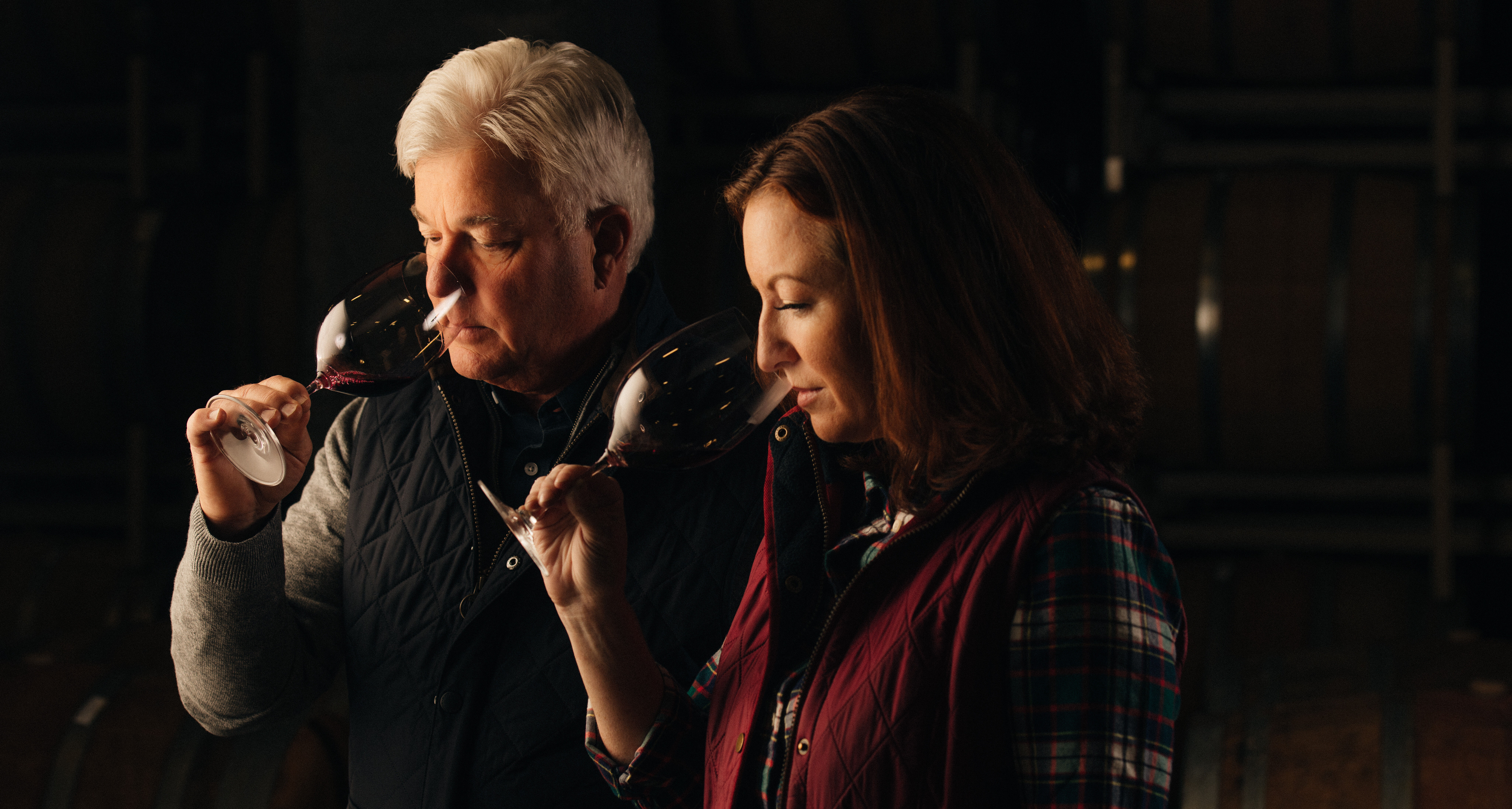 Ted and Kristy sniffing some wine