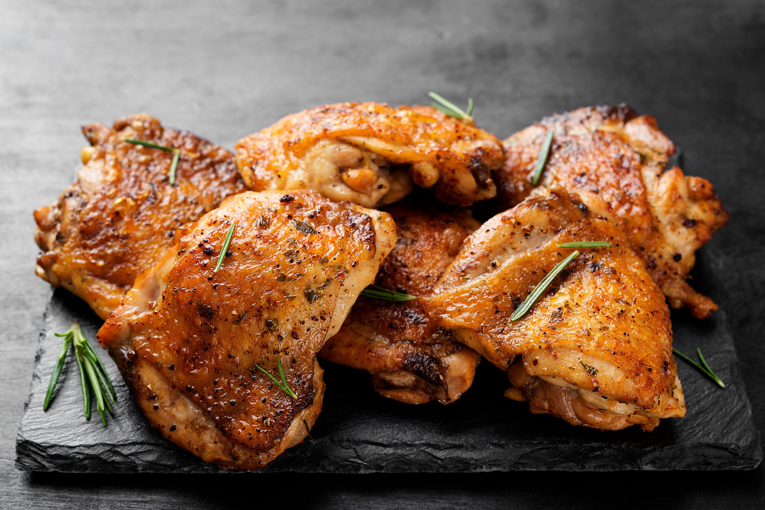 Plated crispy chicken thighs