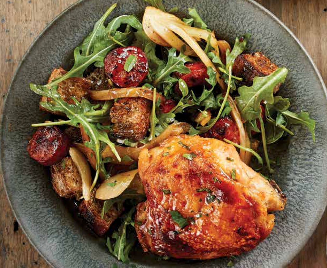 Plated crispy chicken thighs